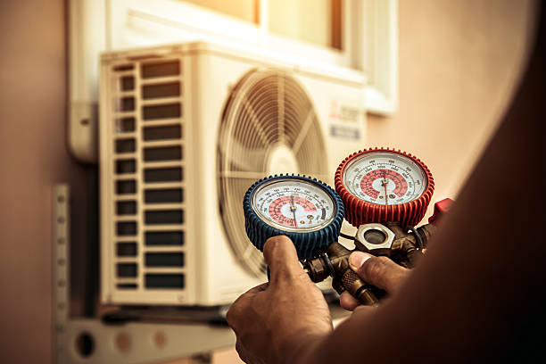 Professional Hvac technician working in Swansea, MA